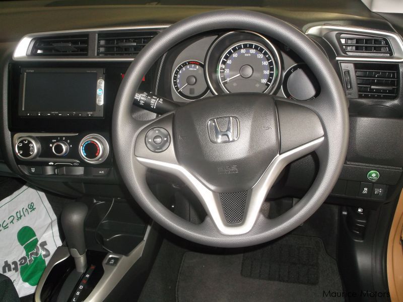 Honda FIT - BROWN BRONZE MET in Mauritius