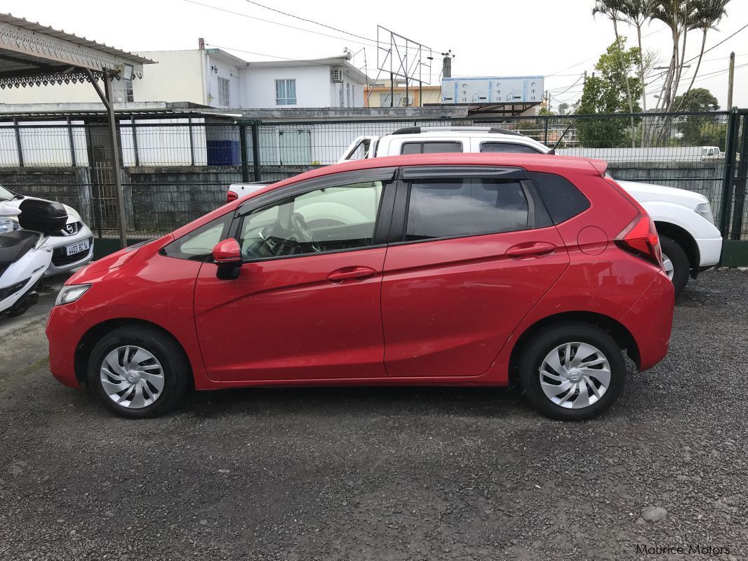 Honda FIT - RED MANUAL in Mauritius