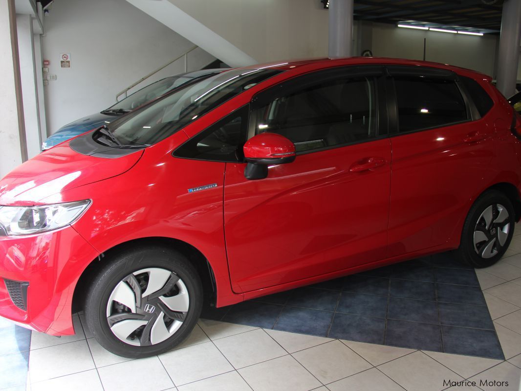 Honda FIT - RED MET - HYBRID in Mauritius