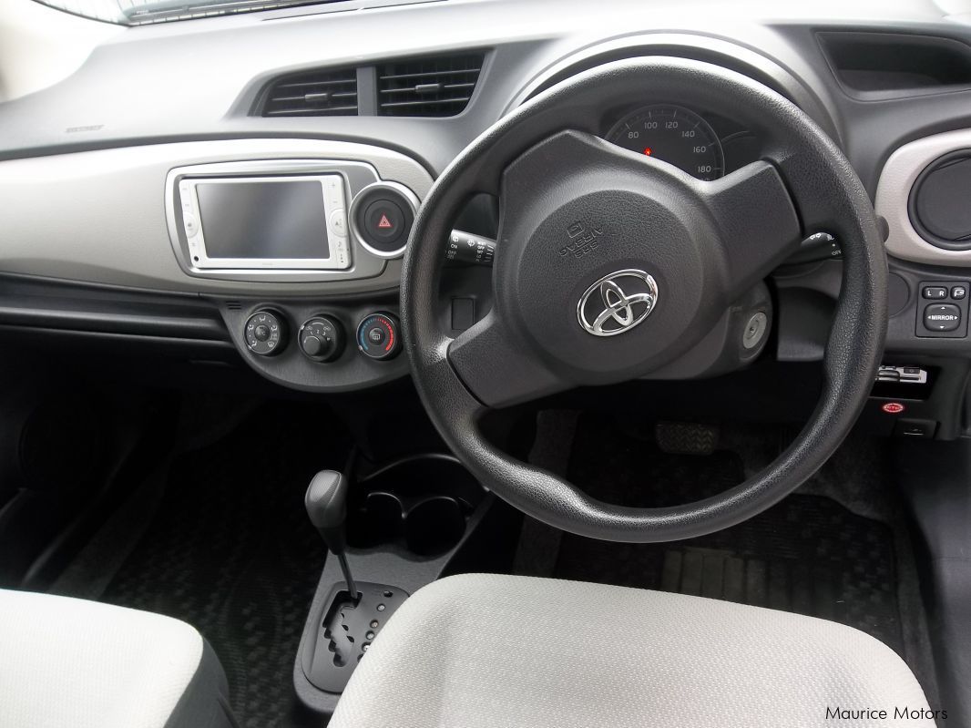 Toyota VITZ - PEARL WHITE in Mauritius