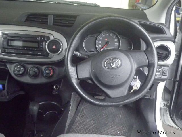 Toyota VITZ F SMART STOP GRADE - WHITE in Mauritius