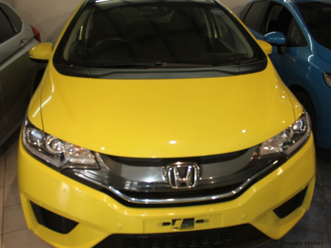 Honda FIT - HYBRID - YELLOW in Mauritius