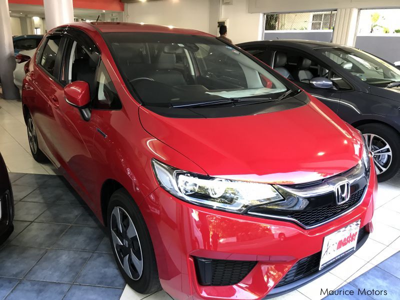Honda FIT - HYBRID RED in Mauritius