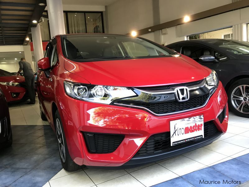 Honda FIT - HYBRID RED in Mauritius