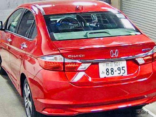 Honda GRACE HYBRID EX - RED in Mauritius