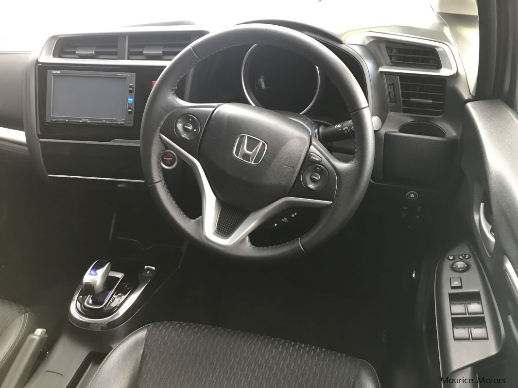 Honda FIT - HYBRID - SILVER in Mauritius